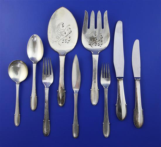 A late 1940s suite of Georg Jensen sterling silver beaded pattern cutlery for six, weighable silver 121.5 oz.